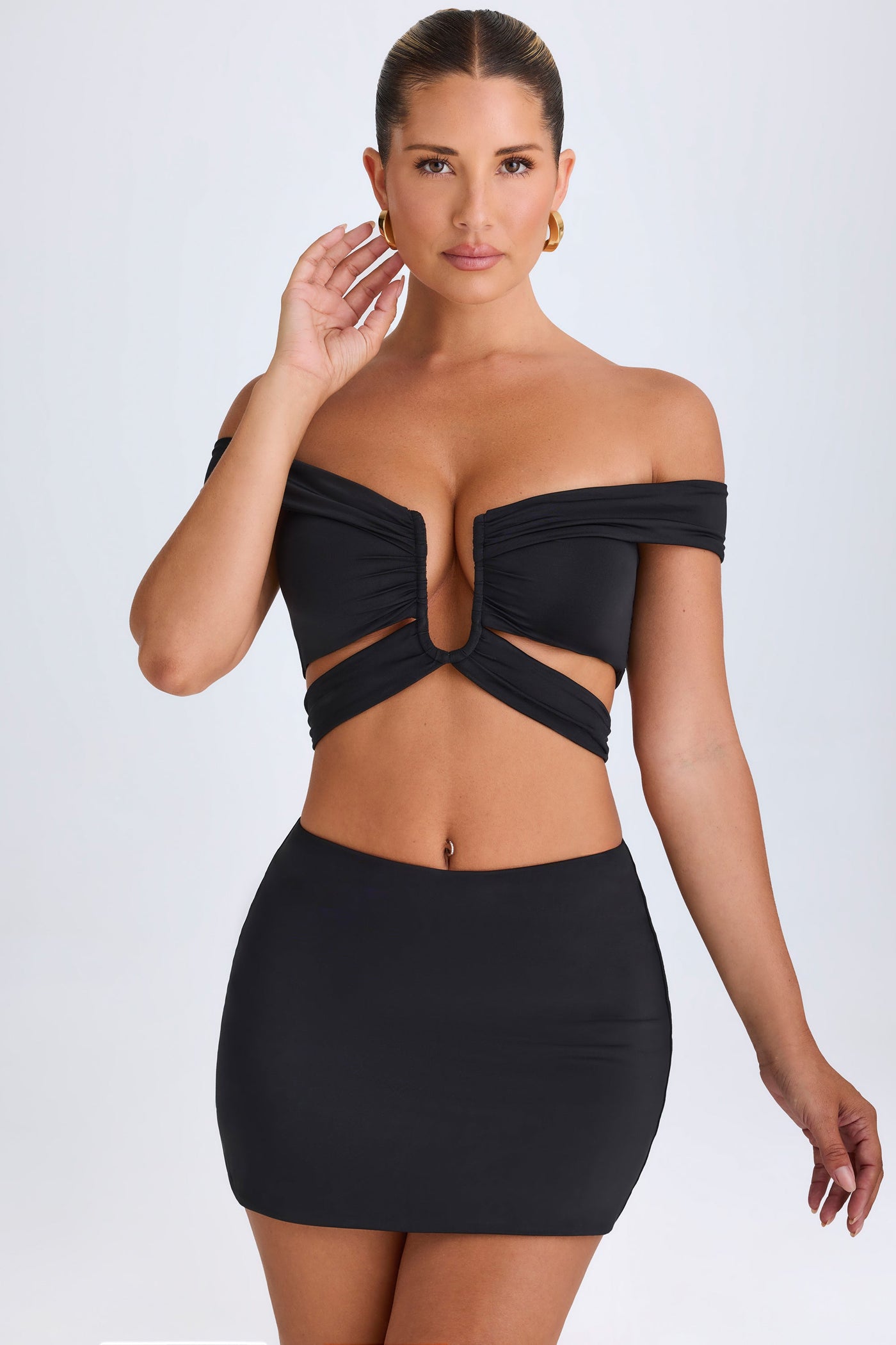 Cut-Out Off-Shoulder Crop Top in Black