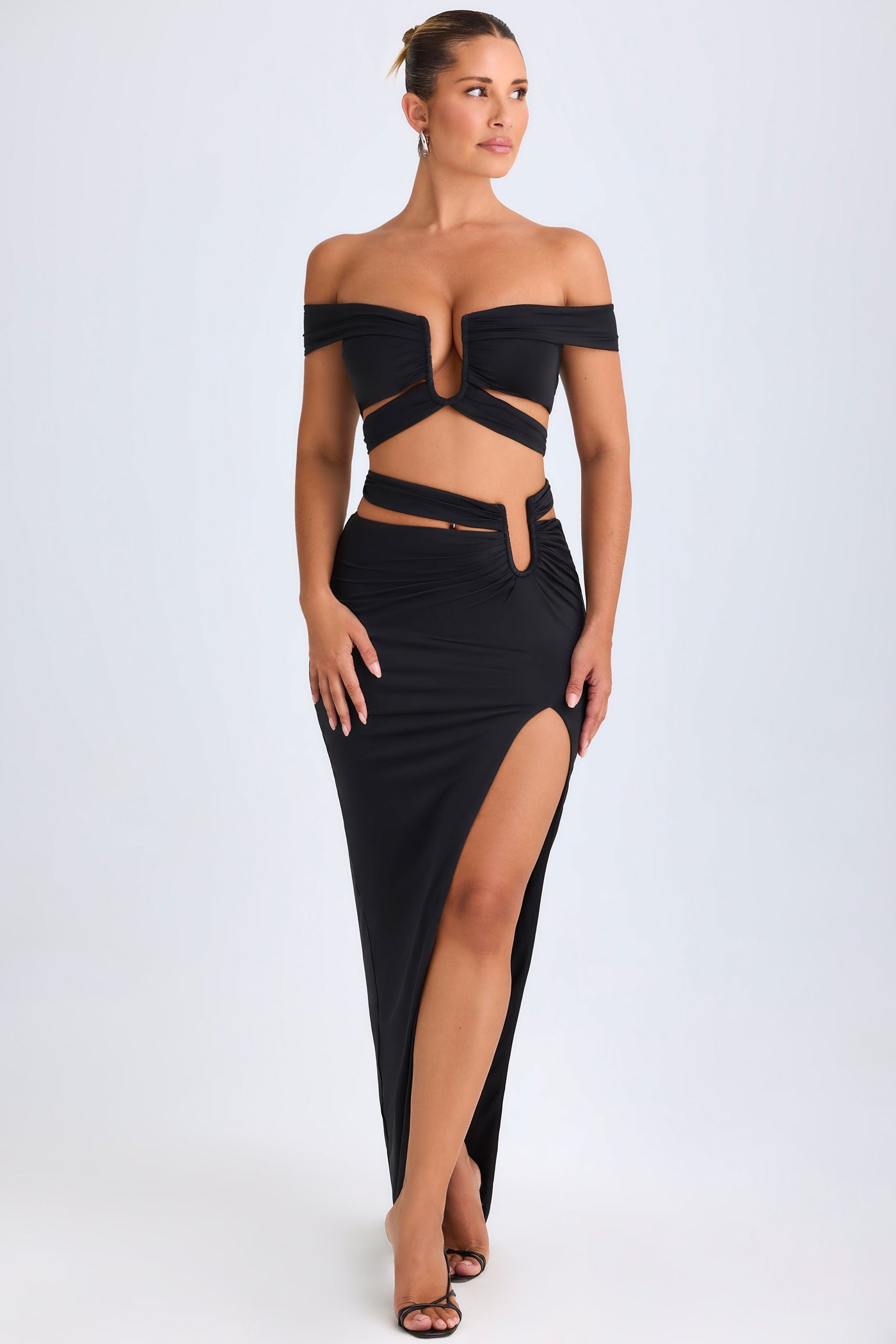 Asymmetric Cut-Out Maxi Skirt in Black