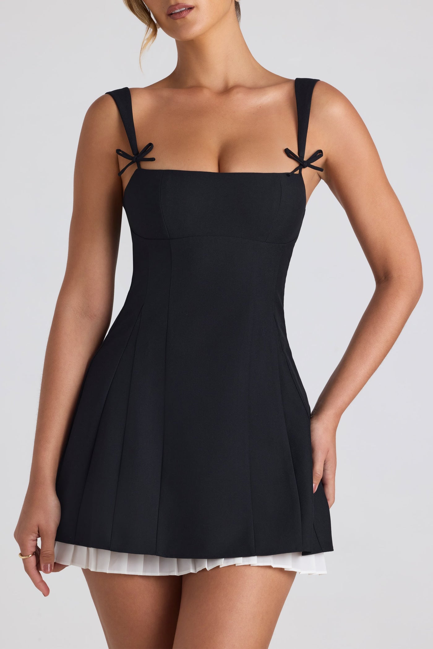 Bow-Detail Pleated A-Line Mini Dress in Black