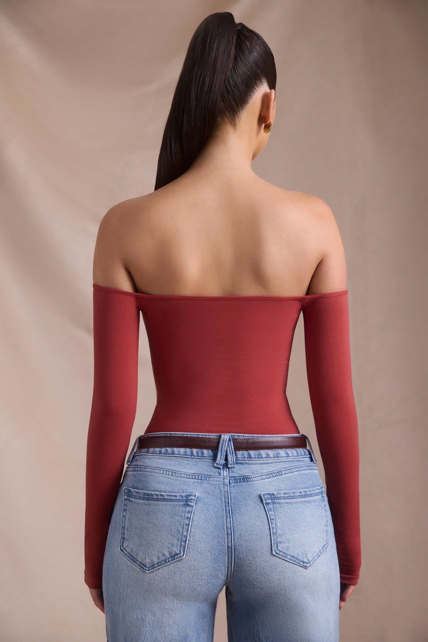 Seamless Off-Shoulder Long-Sleeve Bodysuit in Brick Red