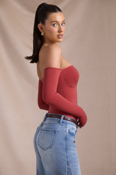 Seamless Off-Shoulder Long-Sleeve Bodysuit in Brick Red